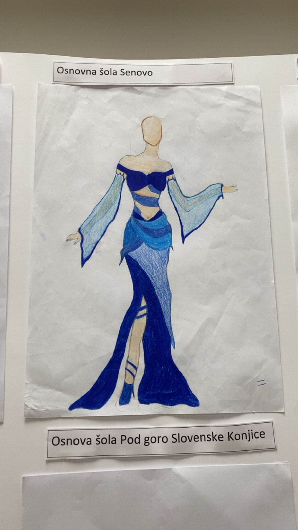 natecaj narisi obleko os senovo